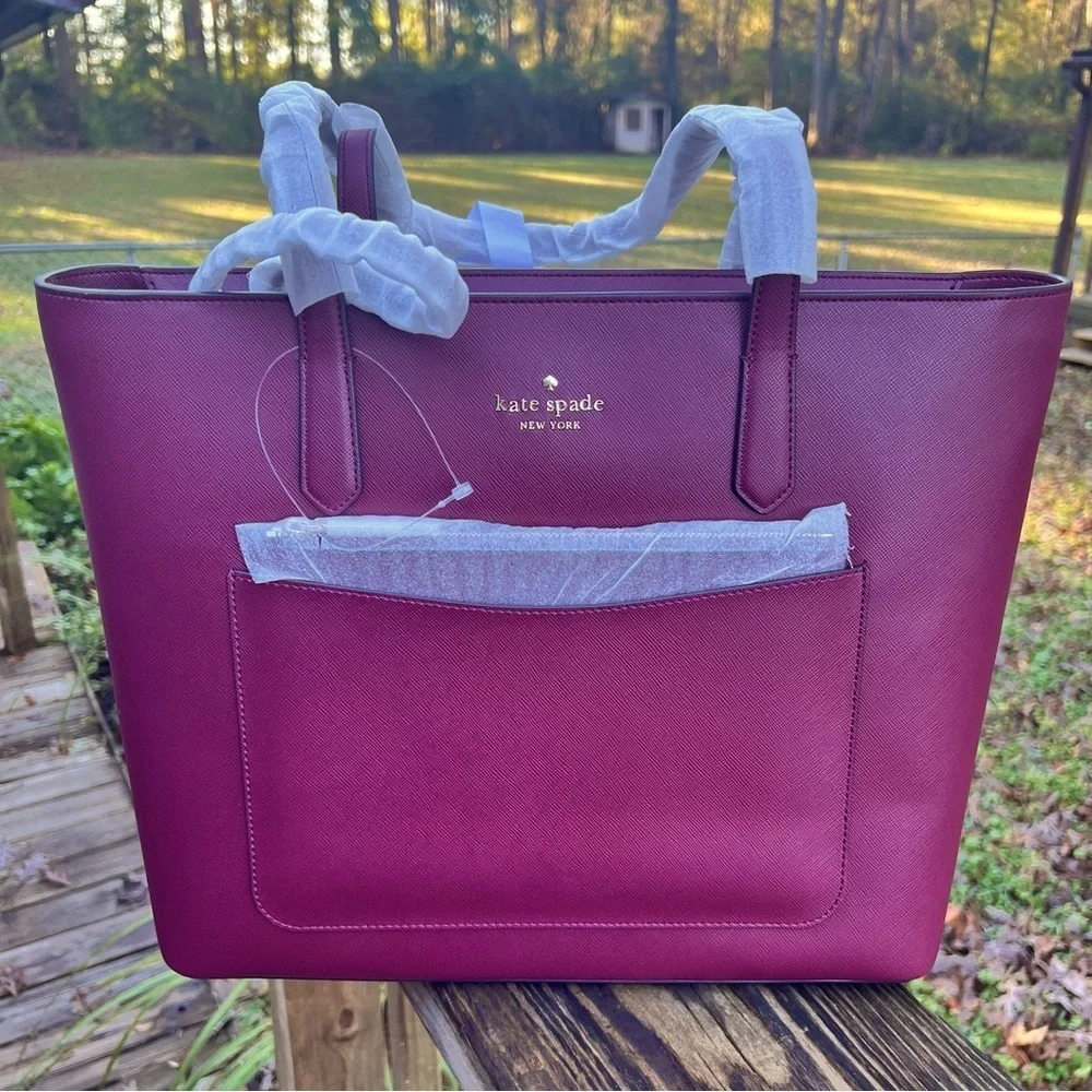 Kate Spade 3 piece set with tote wristlet and pouch